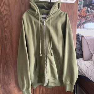 Brandy Melville matcha green zip up Christy hoodie.